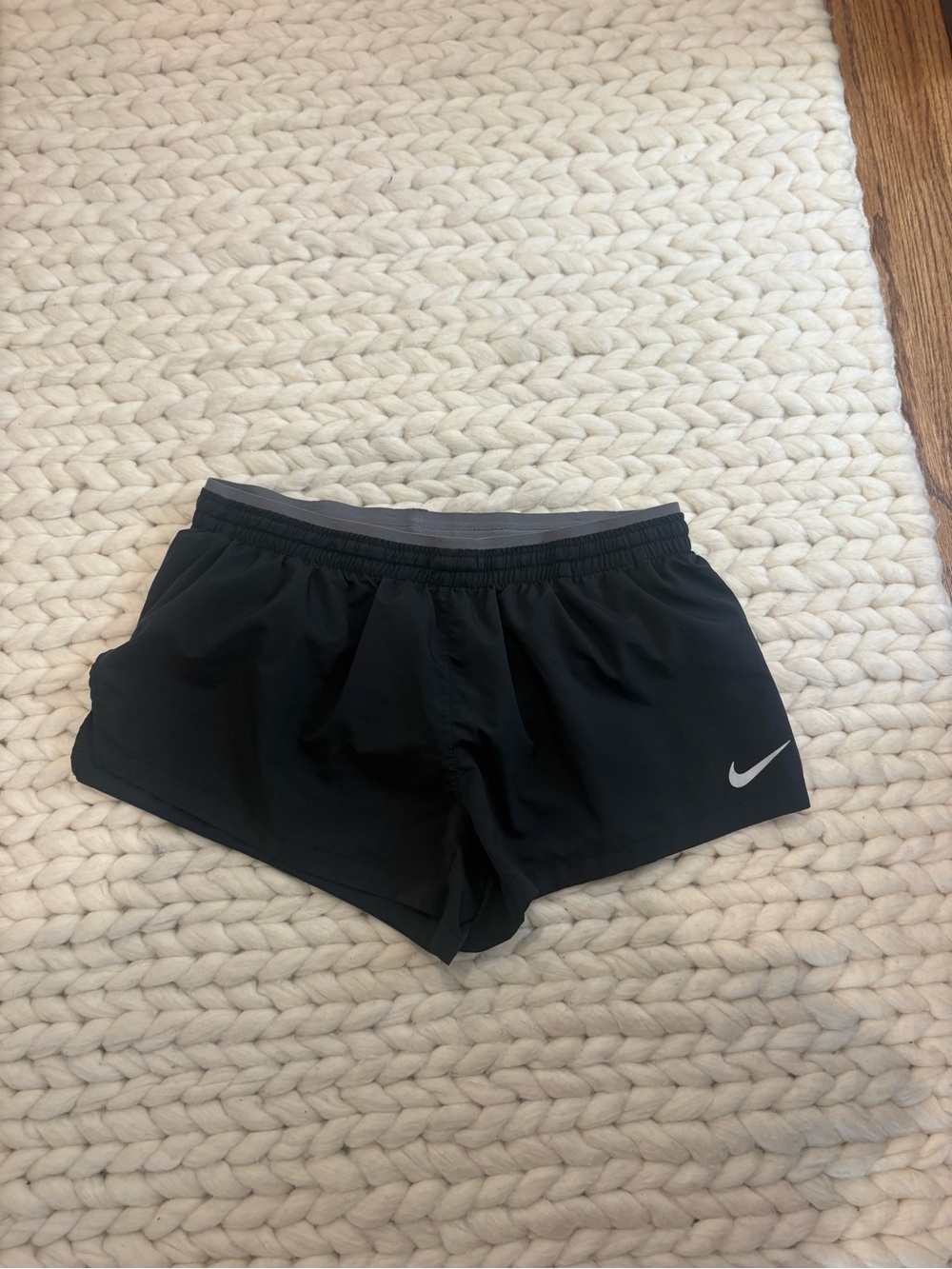 low waisted Nike Women’s Black Dri-FIT Running Shorts